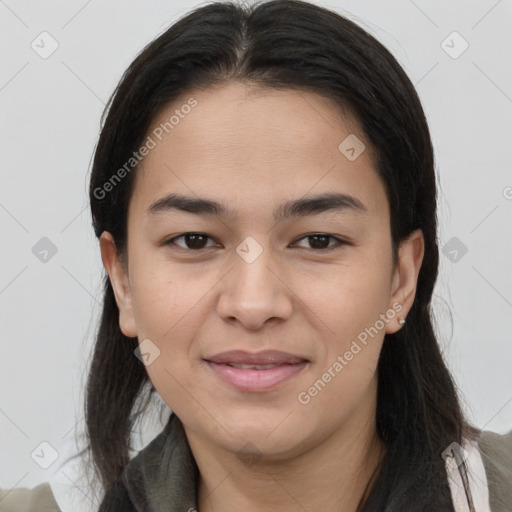 Joyful asian young-adult female with long  brown hair and brown eyes