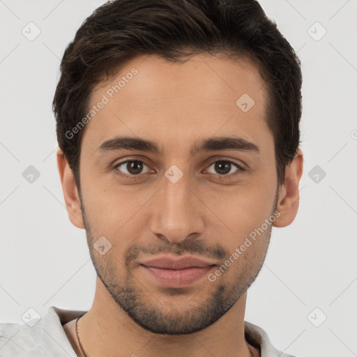 Joyful white young-adult male with short  brown hair and brown eyes