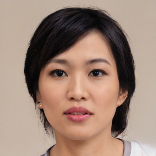 Neutral asian young-adult female with medium  black hair and brown eyes