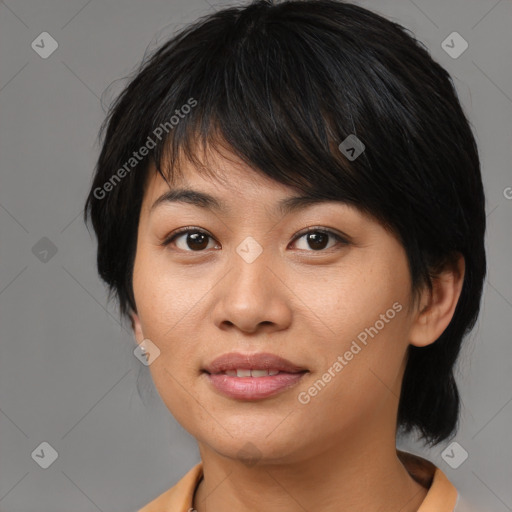 Joyful asian young-adult female with medium  brown hair and brown eyes