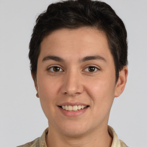 Joyful white young-adult male with short  brown hair and brown eyes