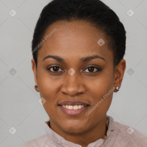Joyful black young-adult female with short  black hair and brown eyes