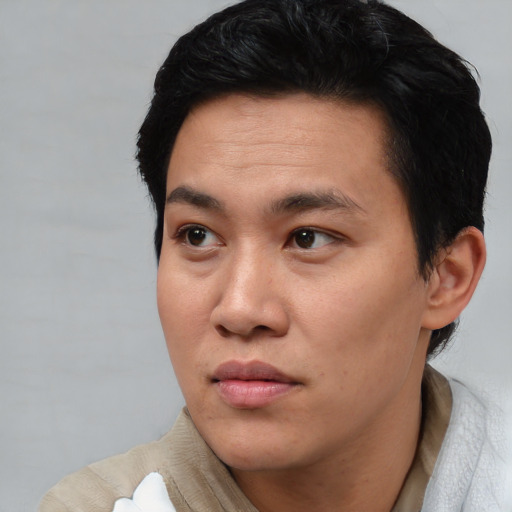 Neutral asian young-adult male with short  black hair and brown eyes