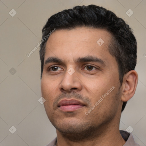 Neutral white young-adult male with short  black hair and brown eyes