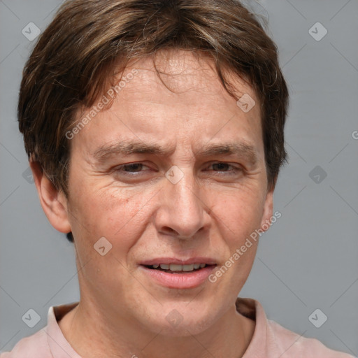 Joyful white middle-aged male with short  brown hair and brown eyes