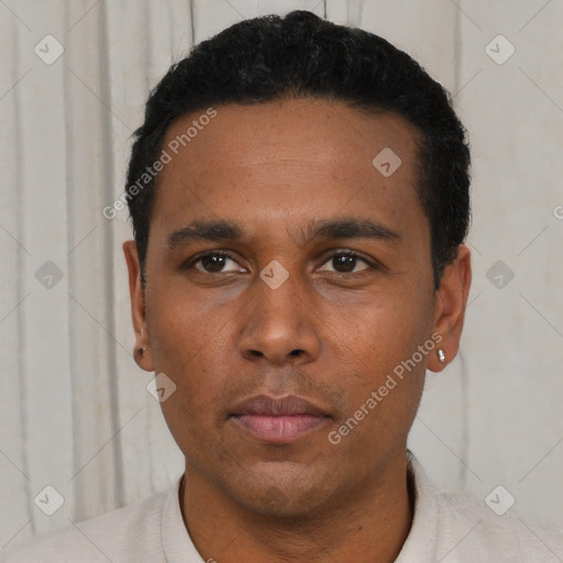 Neutral latino young-adult male with short  black hair and brown eyes