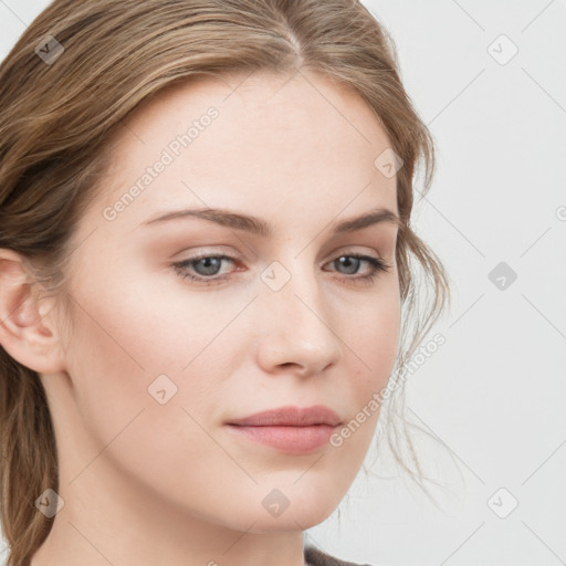 Neutral white young-adult female with long  brown hair and blue eyes