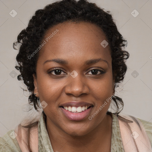 Joyful black young-adult female with long  brown hair and brown eyes