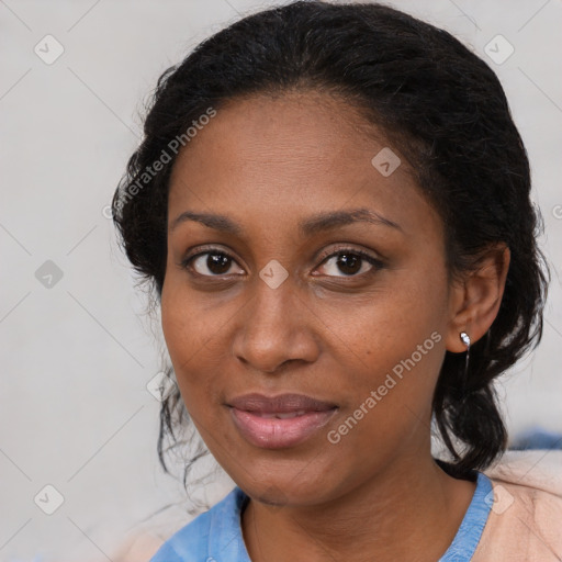 Joyful black young-adult female with medium  brown hair and brown eyes