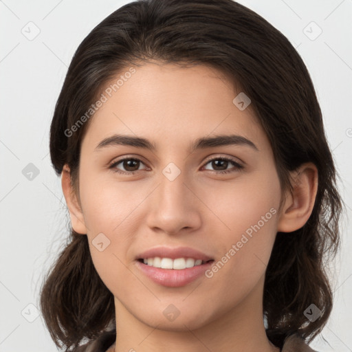 Joyful white young-adult female with medium  brown hair and brown eyes