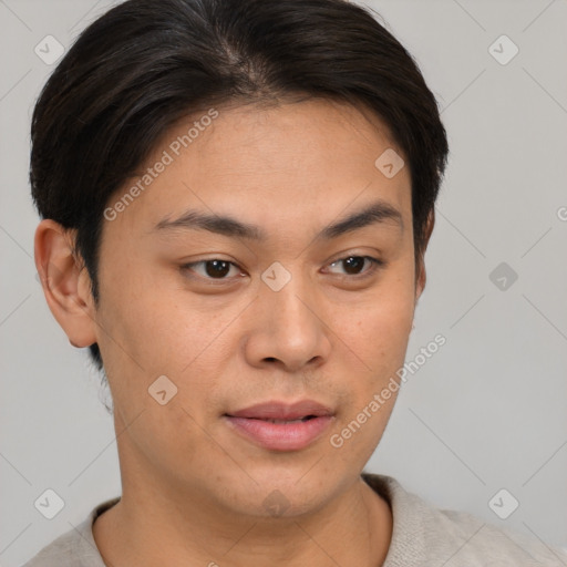 Joyful asian young-adult male with short  brown hair and brown eyes