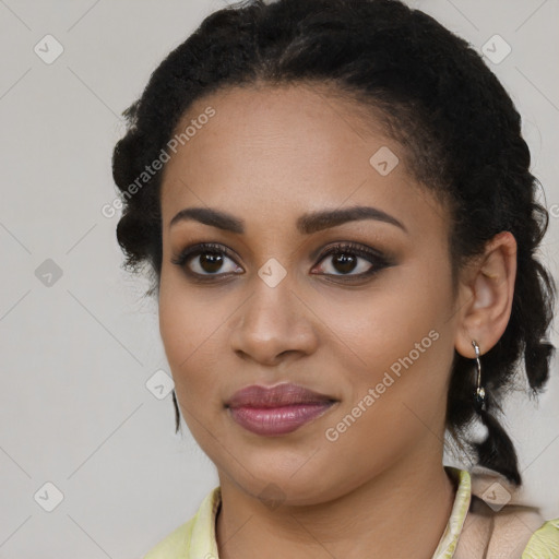 Joyful black young-adult female with medium  black hair and brown eyes