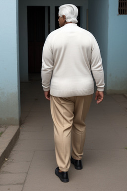 Sri lankan middle-aged male with  white hair