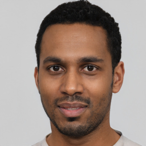 Neutral black young-adult male with short  black hair and brown eyes