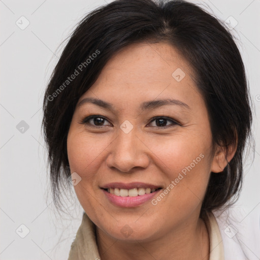 Joyful white adult female with medium  brown hair and brown eyes