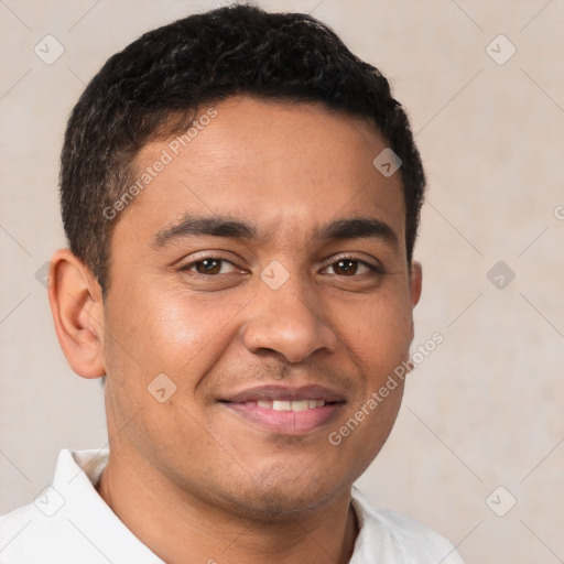 Joyful latino young-adult male with short  brown hair and brown eyes