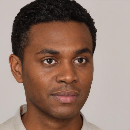 Neutral black young-adult male with short  brown hair and brown eyes