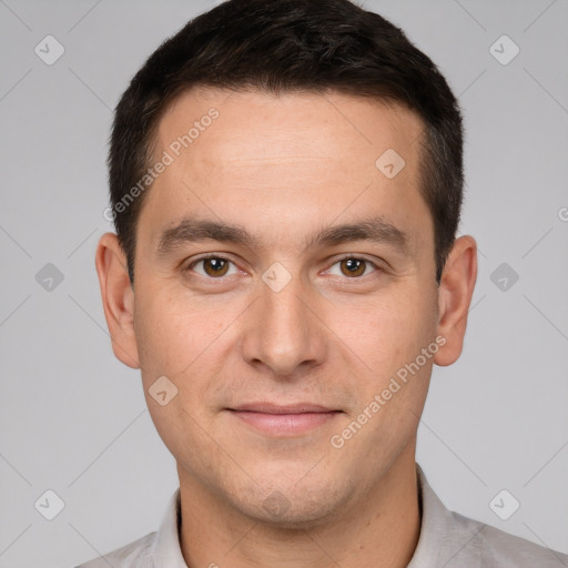 Joyful white young-adult male with short  brown hair and brown eyes