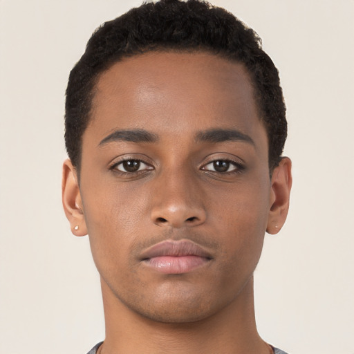 Neutral black young-adult male with short  brown hair and brown eyes