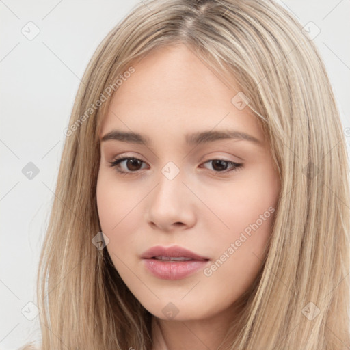 Neutral white young-adult female with long  brown hair and brown eyes