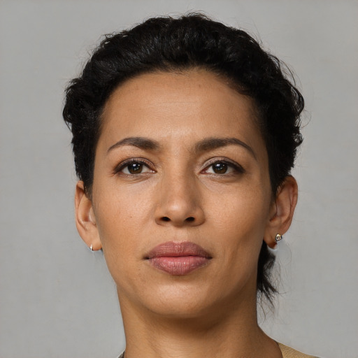 Neutral latino young-adult female with short  black hair and brown eyes