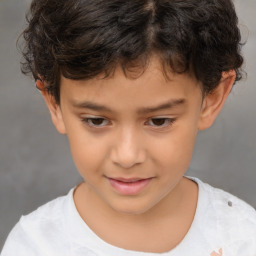 Joyful white child male with short  brown hair and brown eyes