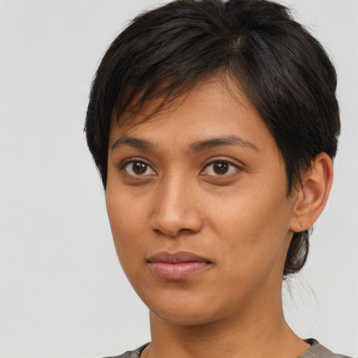 Neutral asian young-adult female with short  brown hair and brown eyes