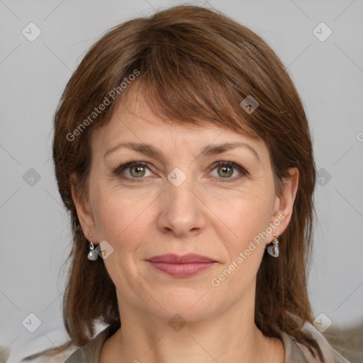 Joyful white adult female with medium  brown hair and grey eyes