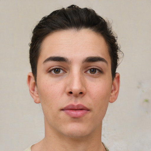 Neutral white young-adult male with short  brown hair and brown eyes