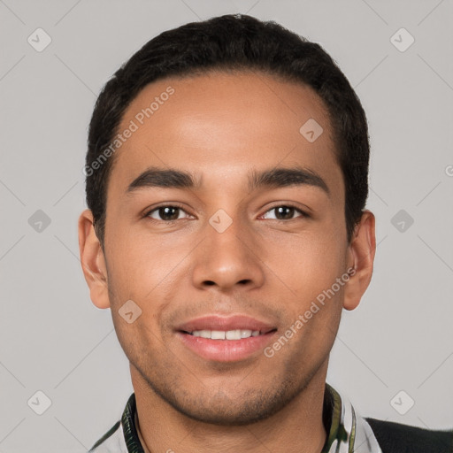 Joyful white young-adult male with short  black hair and brown eyes