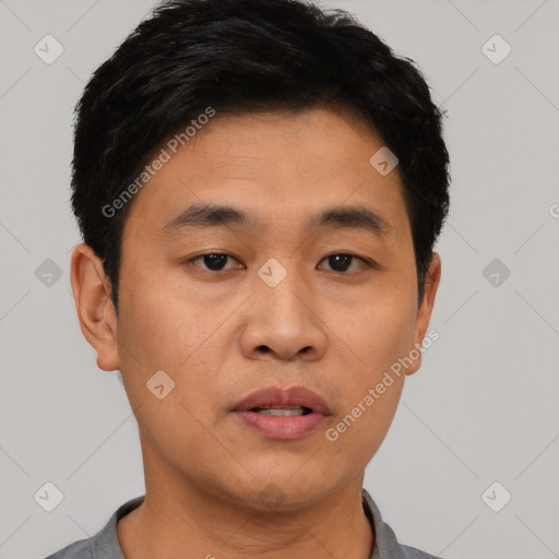 Neutral asian young-adult male with short  black hair and brown eyes