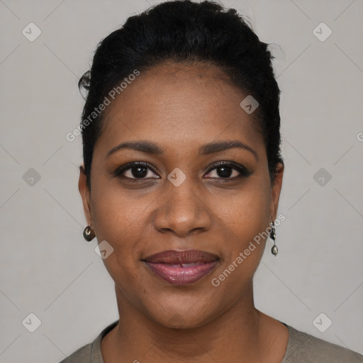 Joyful black young-adult female with short  black hair and brown eyes