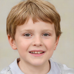 Joyful white child male with short  brown hair and brown eyes