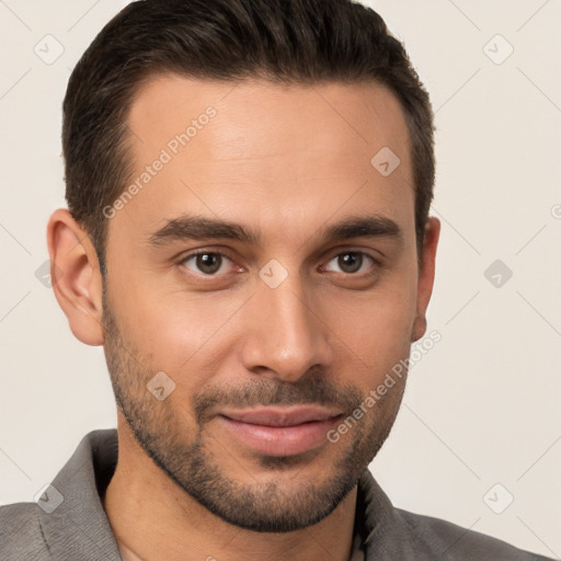 Joyful white young-adult male with short  brown hair and brown eyes