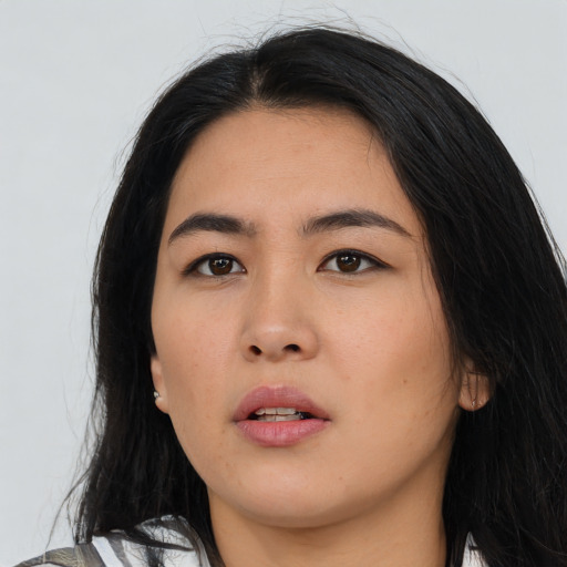 Neutral asian young-adult female with long  black hair and brown eyes