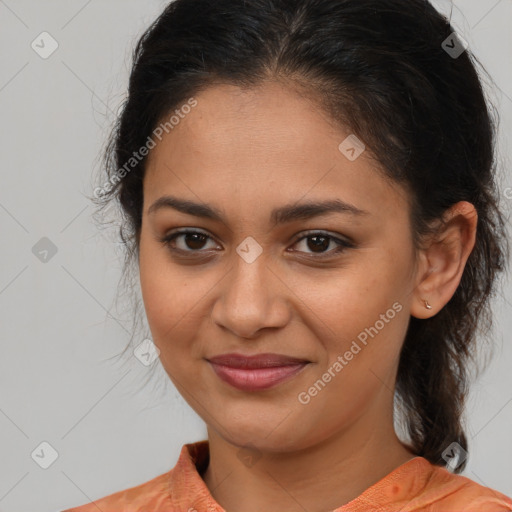 Joyful latino young-adult female with medium  brown hair and brown eyes