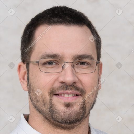 Joyful white adult male with short  brown hair and brown eyes