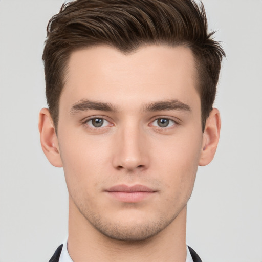 Neutral white young-adult male with short  brown hair and brown eyes