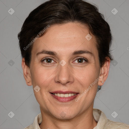 Joyful white adult female with short  brown hair and grey eyes