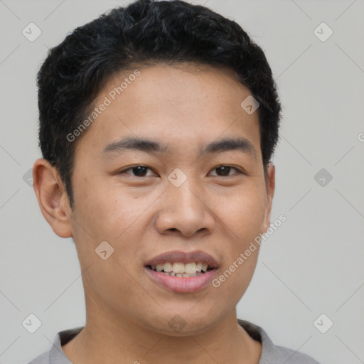 Joyful asian young-adult male with short  black hair and brown eyes