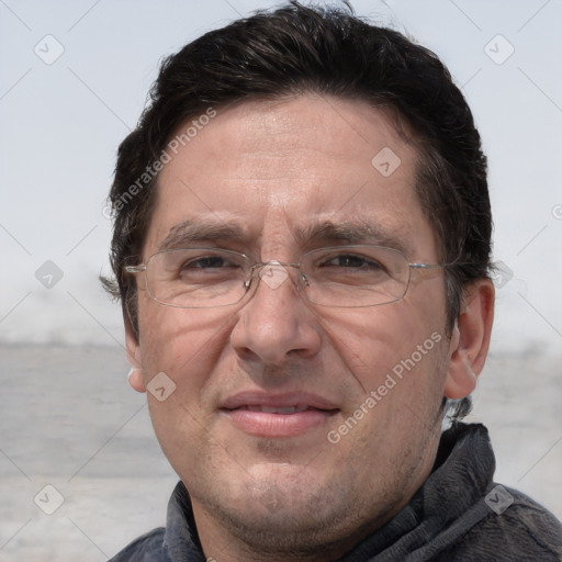 Joyful white adult male with short  brown hair and grey eyes