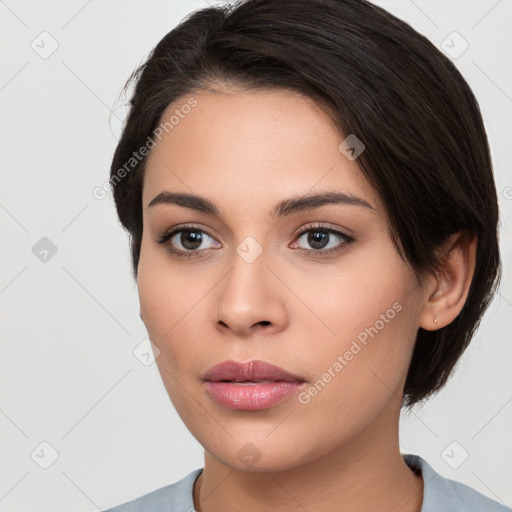 Neutral white young-adult female with medium  brown hair and brown eyes