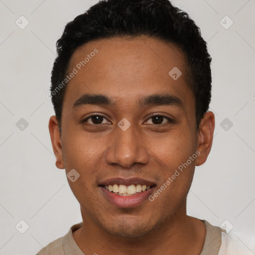 Joyful latino young-adult male with short  brown hair and brown eyes