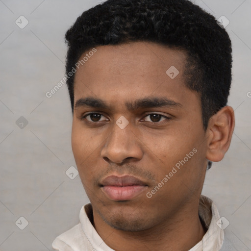 Neutral latino young-adult male with short  black hair and brown eyes