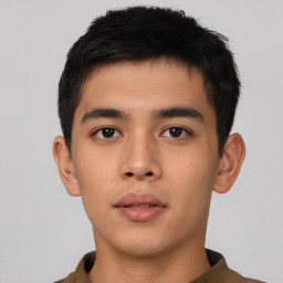 Neutral asian young-adult male with short  brown hair and brown eyes