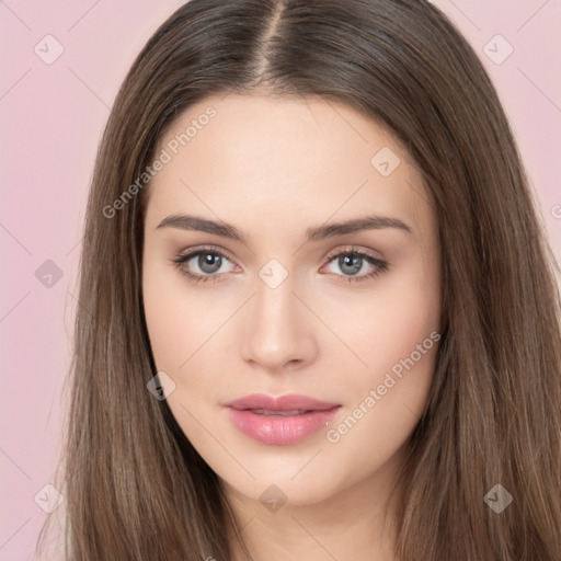 Neutral white young-adult female with long  brown hair and brown eyes