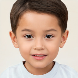 Joyful white child male with short  brown hair and brown eyes