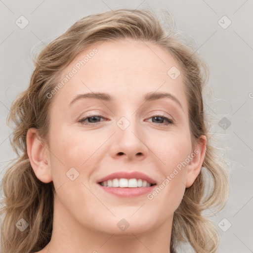 Joyful white young-adult female with medium  brown hair and blue eyes