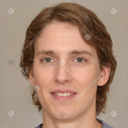 Joyful white young-adult female with medium  brown hair and green eyes