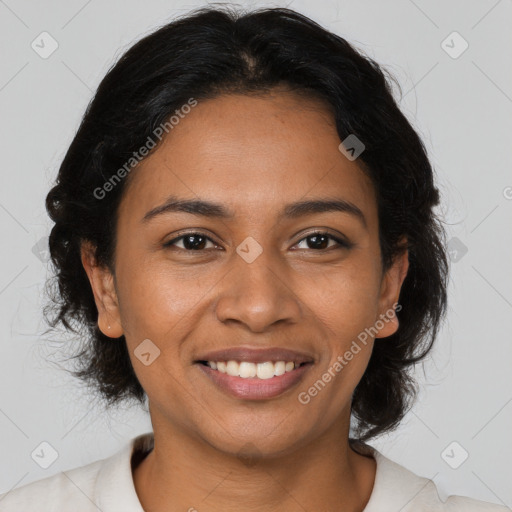 Joyful latino young-adult female with medium  brown hair and brown eyes